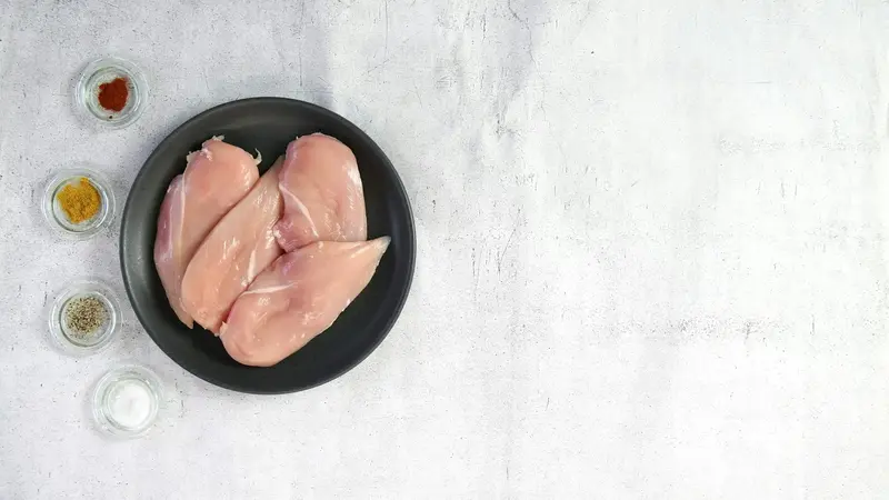 Frozen IQF boneless skinless chicken thighs — individually quick frozen pieces